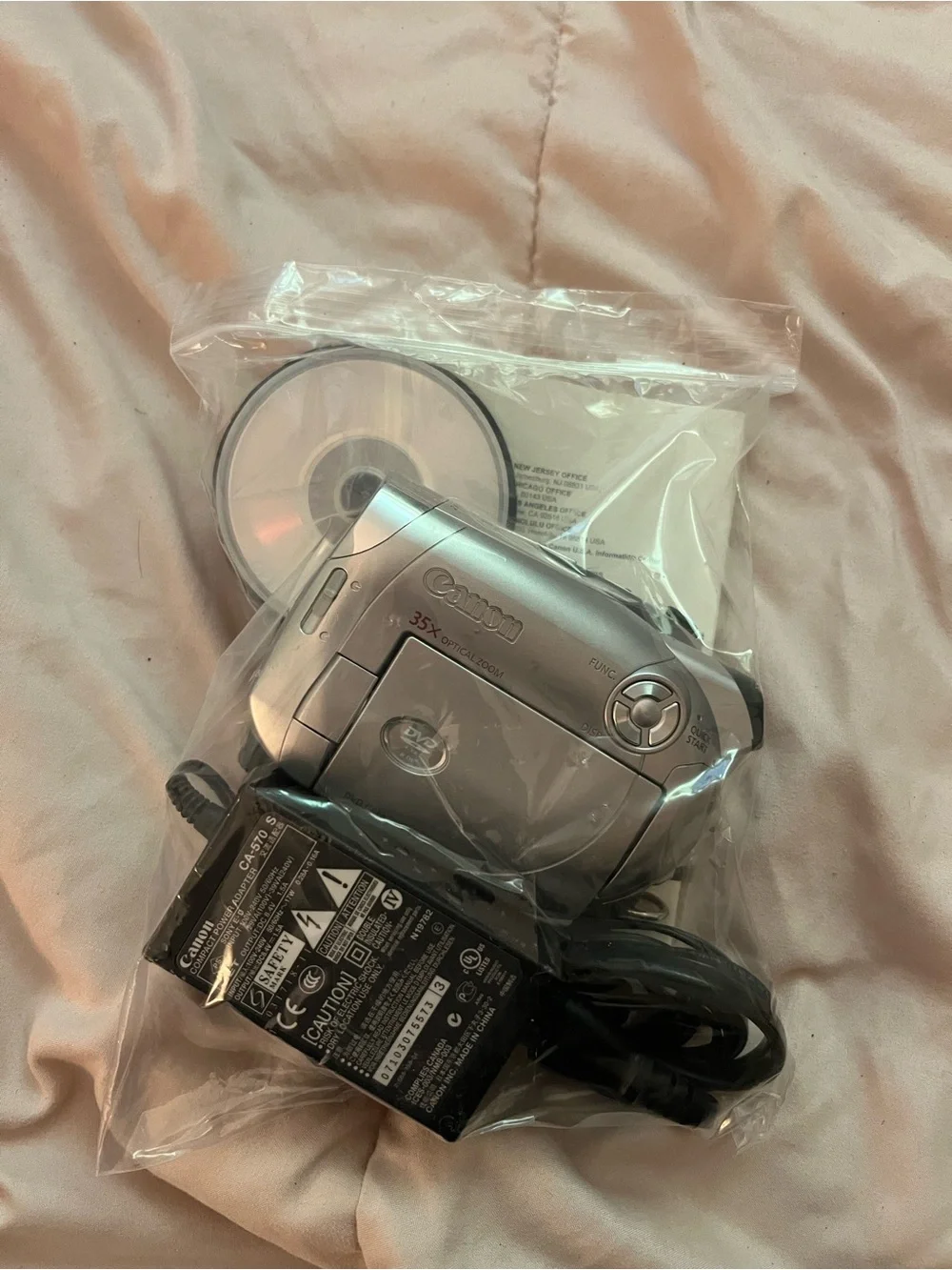 Canon Silver Mini DV Camcorder with Charger and Discs in Clear Bag
